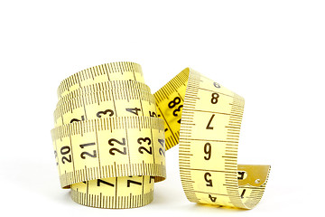 Image showing Yellow measuring tape isolated on white