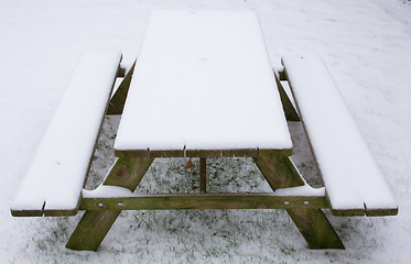 Image showing Picknick table covered in snow