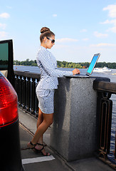 Image showing beautiful woman with the laptop