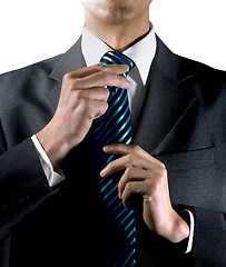 Image showing to tie one's tie