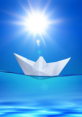 Image showing paper toy-ship under sun