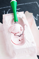 Image showing Strawberry ice cream and scoop