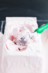 Image showing Strawberry ice cream and scoop