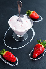 Image showing Strawberry ice cream and whole strawberries