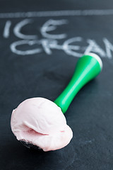 Image showing Strawberry ice cream and scoop