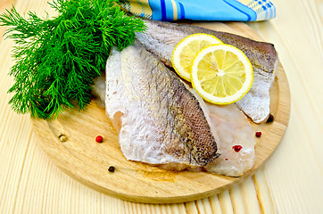 Image showing Fillet of codfish on board with napkin