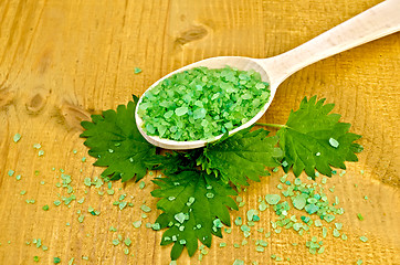 Image showing Salt green in a spoon with a nettle on the board