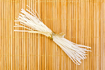 Image showing Noodles rice on a bamboo napkin