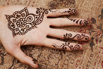 Image showing Henna art on woman's hand