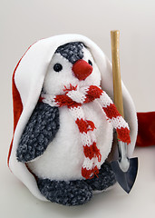 Image showing Penguin in cap with spade