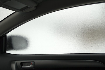 Image showing Frozen side window of the car