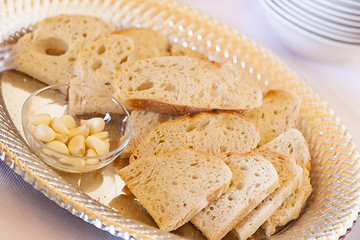 Image showing Tray of Fresh Made Sourdough Bread with Garlic Cloves