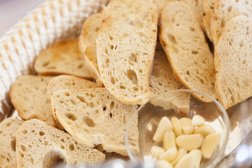 Image showing Tray of Fresh Made Sourdough Bread with Garlic Cloves