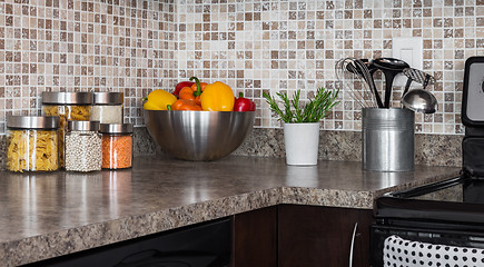 Image showing Food ingredients and herbs on kitchen countertop 