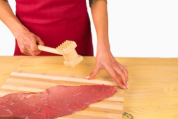 Image showing Tenderizing a steak