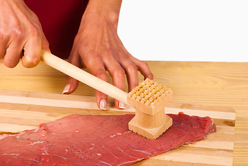 Image showing Tenderizing a steak