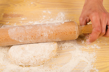 Image showing Working with a rolling pin