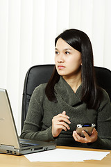 Image showing Busy businesswoman