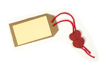 Image showing Paper label with rope and red hearts