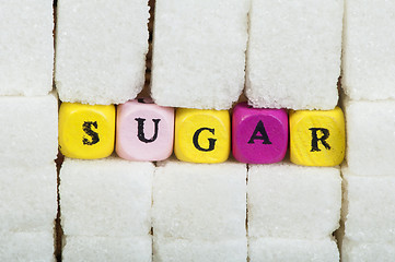 Image showing Sugar lumps and text
