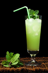 Image showing Green cocktail with cubes ice