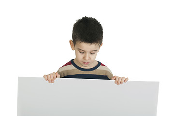 Image showing Little boy holding a whiteboard
