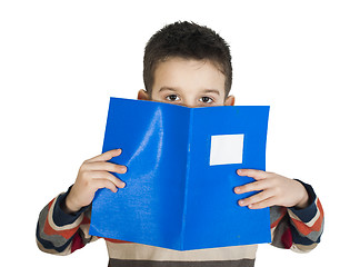 Image showing Child with notebook in front of the face