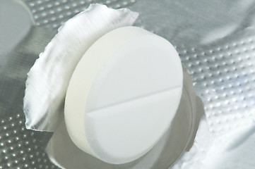 Image showing White pill in a pack very close up