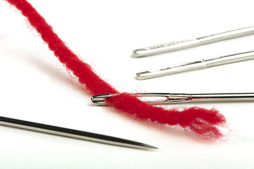 Image showing Sewing needles and red thread