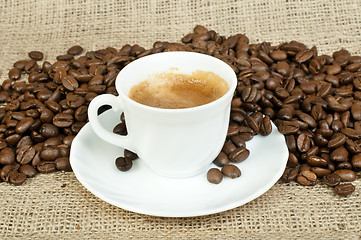Image showing Cup of coffee and coffee beans