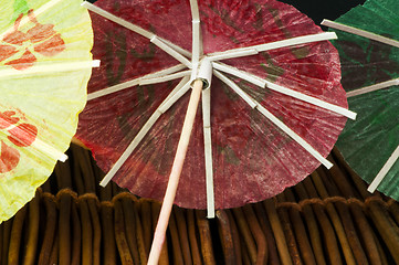 Image showing Colorful cocktail umbrellas