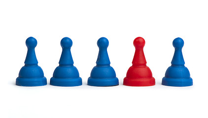 Image showing Red and blue game pawns white isolated