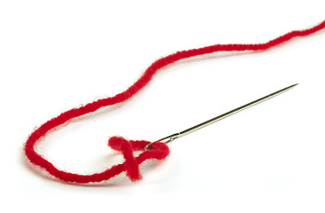 Image showing Sewing needle and red thread