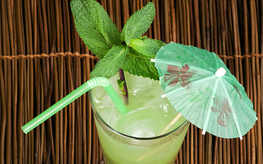 Image showing Green cocktail with cubes ice