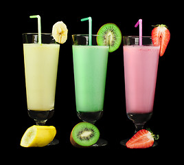 Image showing Banana, kiwi and strawberry milk shake and fresh fruis