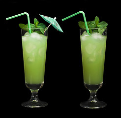 Image showing Green cocktail with cubes ice