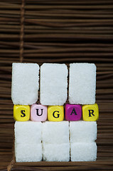 Image showing Sugar lumps and text