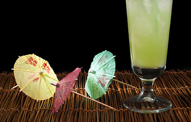 Image showing Colorful cocktail umbrellas