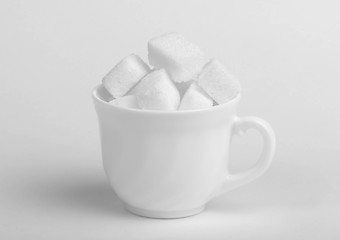 Image showing Sugar lumps in cup