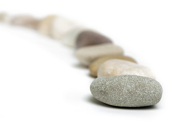 Image showing Stacked stones white isolated