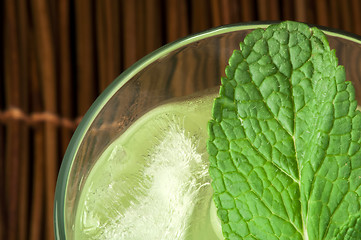 Image showing Green cocktail with cubes ice