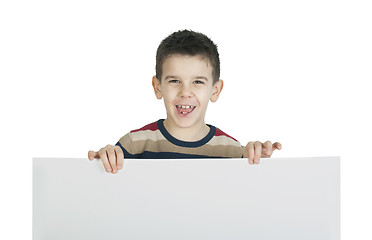 Image showing Little boy holding a whiteboard