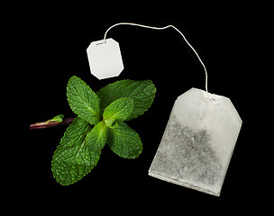 Image showing Tea bag and fresh mint