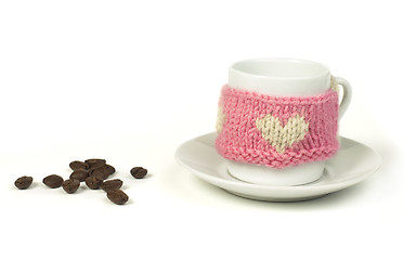 Image showing Cup of coffee with knitted heart symbol