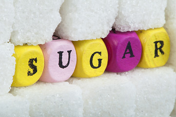 Image showing Sugar lumps and text