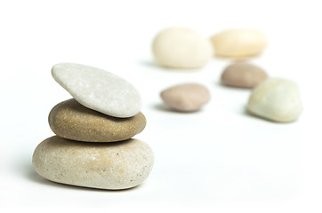 Image showing Stacked stones white isolated