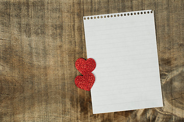 Image showing Red hearts and white paper sheet