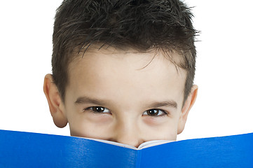 Image showing Child with notebook in front of the face