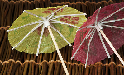 Image showing Colorful cocktail umbrellas