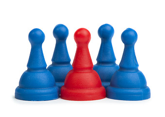 Image showing Red and blue game pawns white isolated